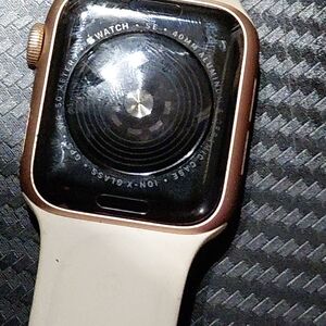 Smartwatch with Gold Case and White Band
